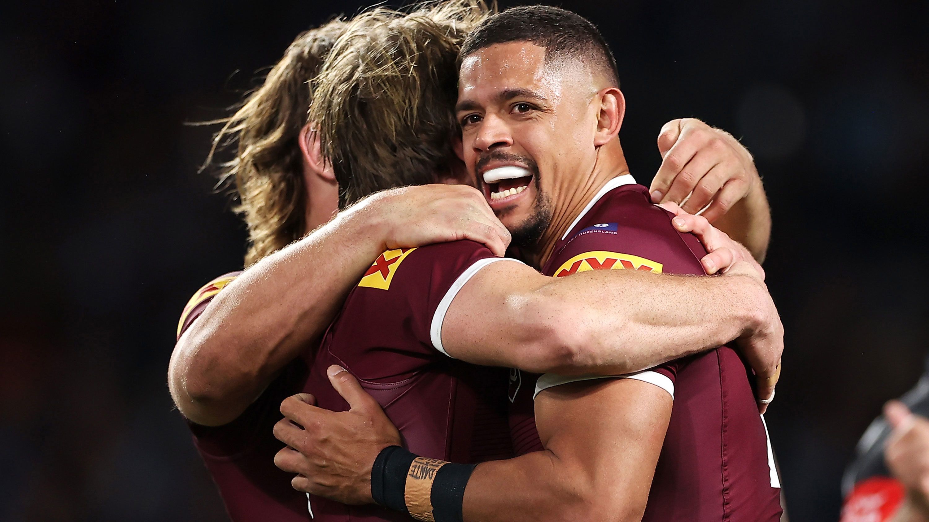 Dane Gagai celebrates with Maroons teammates after scoring a try during the 2022 Origin series.