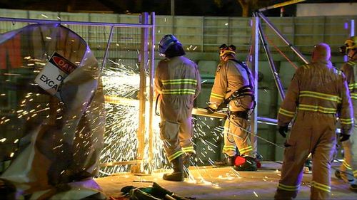 Emergency services had to winch one of the women from the site. (9NEWS)