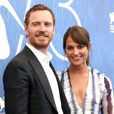 Alicia Vikander and Michael Fassbender attend a photocall for The Light Between Oceans in 2016.
