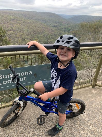 Jill and Huey cancer riding his bike