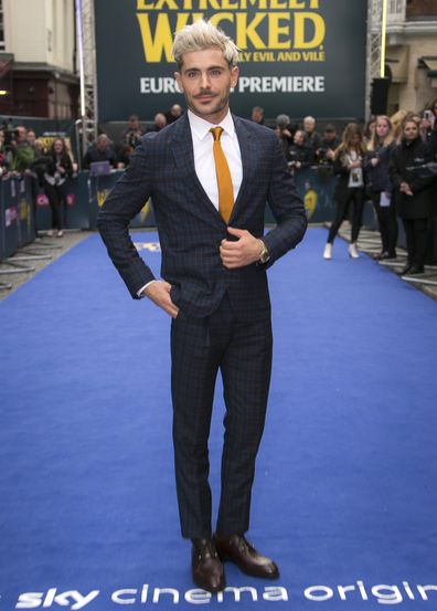 Zac Efron poses for photographers as he arrives for the 'Extremely Evil, Incredible and Evil' premiere in London on April 24, 2019. 