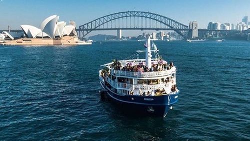 Man hospitalised, another arrested on Seadeck cruise in Sydney Harbour
