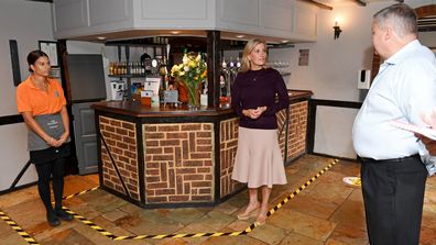 Sophie, Countess Of Wessex speaks to employees and Conrad Sturt during her visit at 'The Half Moon' public house on July 08, 2020 in Windlesham, England. 