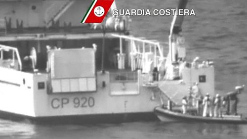 The Italian Coast Guard conducts search operations looking for survivors. (AAP)