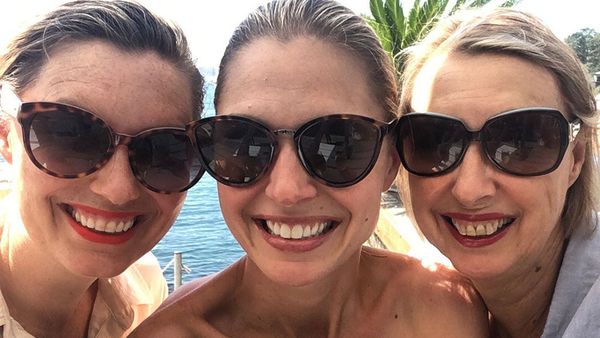 Amelia Adams with her mum and sister, Lucy