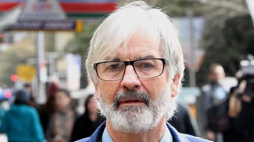 Australian actor John Jarratt arrives at the Downing Centre Local Court today.