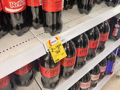 impulse buy supermarket checkout Coles Woolworths aldi iga