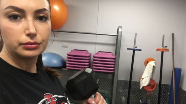 Natalie working out at her gym