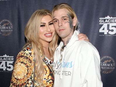 Model Melanie Martin  (L) and her fiance, singer and producer Aaron Carter
