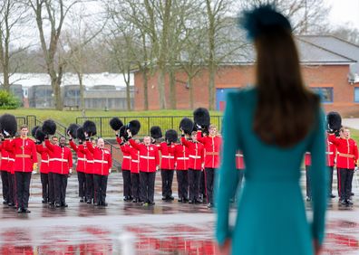 Catherine, Princess of Wales takes the salute as the new Colonel of the Irish Guards during the St. Patrick's Day Parade at Mons Barracks on March 17, 2023 in Aldershot, England.  