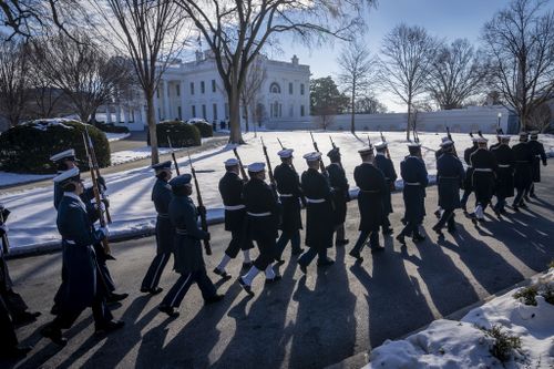 Members of the U.S. military Joint Honor Guard parade as they rehearse ahead of the upcoming presidential inauguration