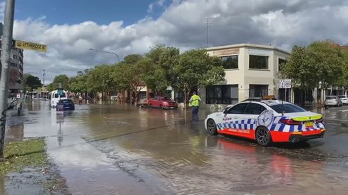 Man rescued after driving into floodwaters in Penrith.
