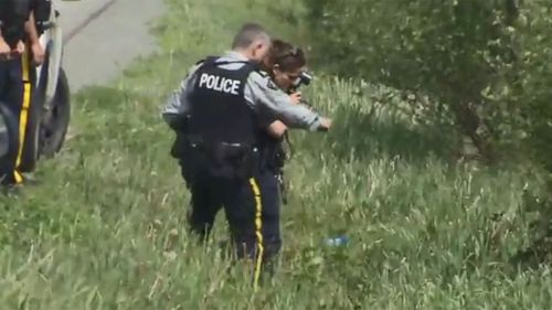 Royal Canadian Mounted Police at the scene of a fatal dog attack in Nova Scotia.