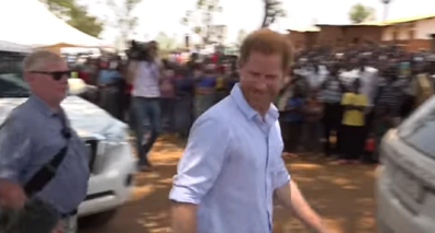 Prince Harry chastises UK reporter for asking unscheduled question.