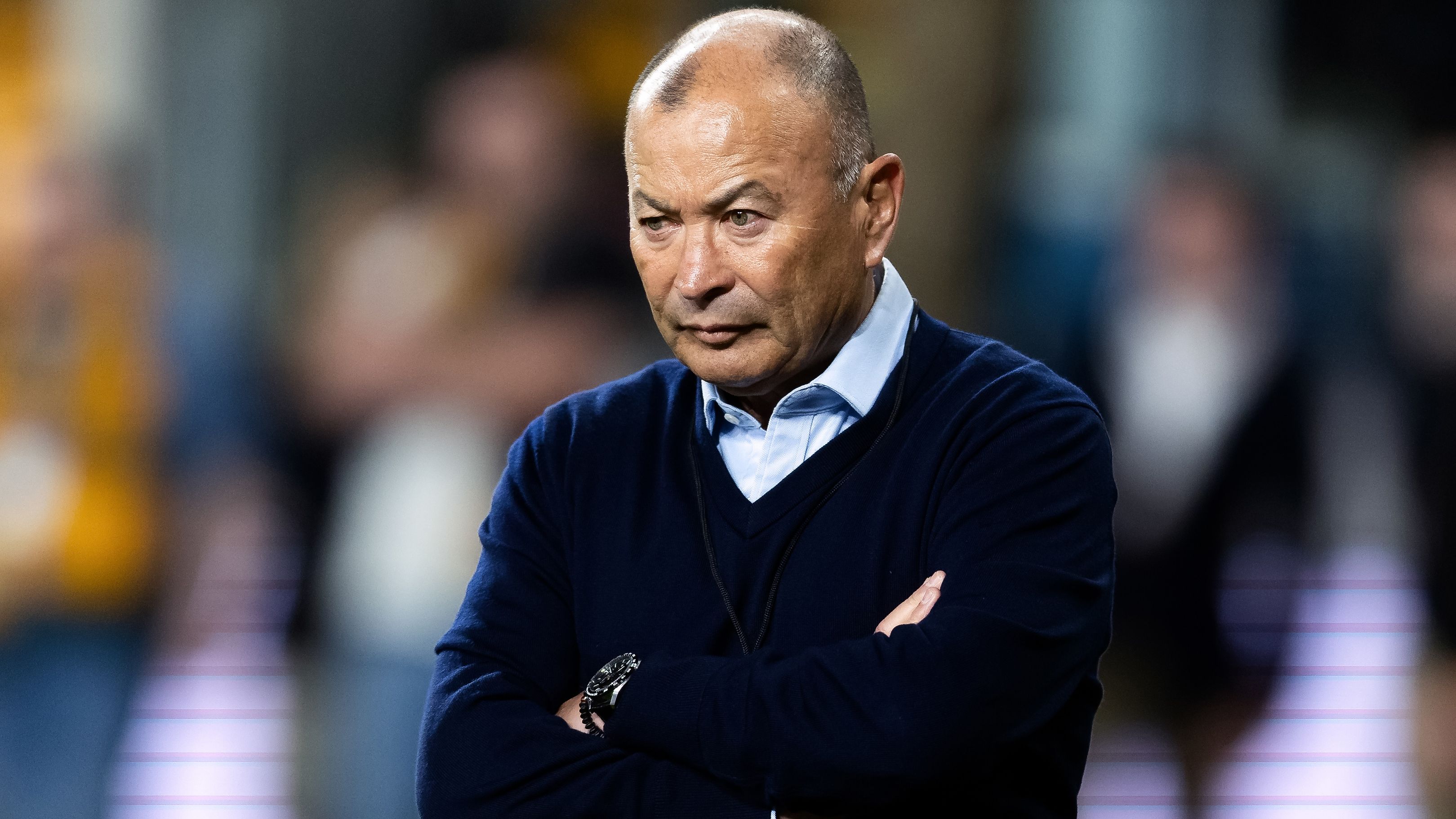 Eddie Jones watches the forwards warm up at CommBank Stadium.