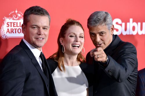 Matt Damon and George Clooney on the red carpet with Suburbicon co-star Julianne Moore. (AAP)