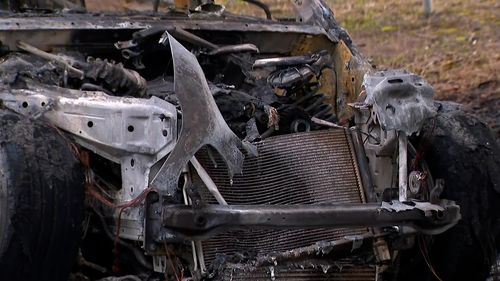 A burnt-out car believed to be linked to the shooting.