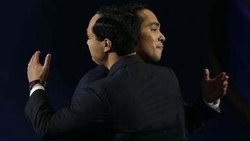Julian Castro embraces his identical twin brother Joaquin.