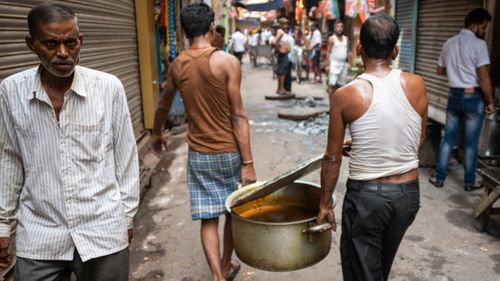 Boy dies after falling into curry pot