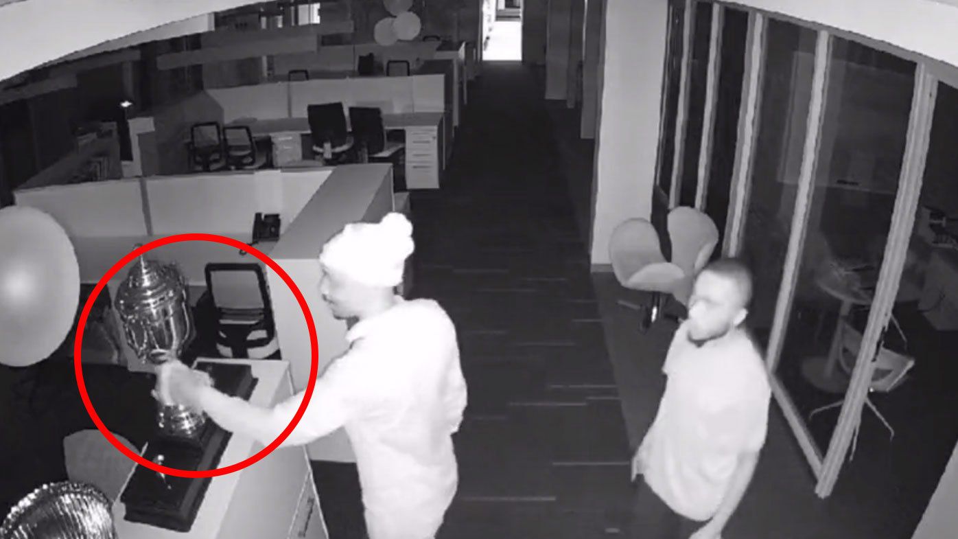 CCTV from inside SARU House in Cape Town shows footage of one of the thieves touching the Webb Ellis Cup