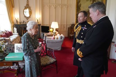 Queen Elizabeth II with Rear Admiral James Macleod and Major General Eldon Millar (right) as she meets the incoming and outgoing Defence Service Secretaries during an in-person audience at Windsor Castle. Rear Admiral Macleod relinquished his appointment as Defence Services Secretary as  Major General Millar assumed the role. Picture date: Wednesday February 16, 2022.  