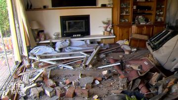 Elderly couple left without home after car crashes into lounge room