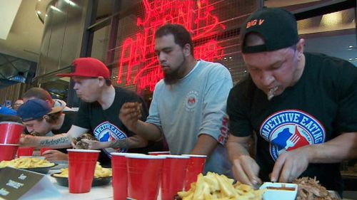 Competitors were lined up side-by-side for the all American themed eat-off. (9NEWS)