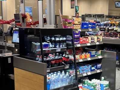 impulse buy supermarket checkout Coles Woolworths aldi iga