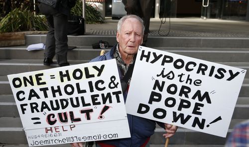 Protester Joe Mitchell outside Newcastle Local Court today. Picture: AAP