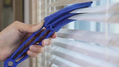 Cleaning Hack Uses a Toilet Paper Roll to Vacuum Sliding Door Tracks