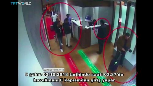 This image taken from a surveillance camera shows people inside Ataturk International Airport, Istanbul, Turkey, on Oct. 2, 2018. The text in Turkish reads: "nine people enter from airport's E Gate on October 2, 2018 around 03:37." 