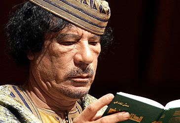 What political philosophy did Muammar Gaddafi describe in The Green Book?
