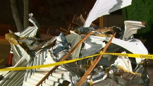 This roof was blown off a Melbourne home, but SES are waiting for light this morning to remove asbestos.