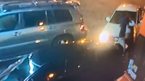 Video showed a man forcing a woman into a white car in Miami.