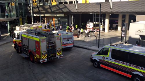 Six people injured after bus slams into wall at train station in Sydney's north