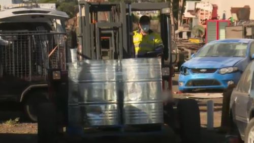 A fork-lift was used in the raids. (9NEWS)