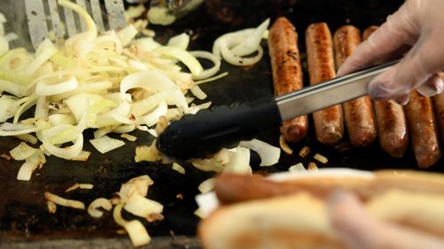 On top or underneath, the iconic democracy sausage will have grilled onions regardless.