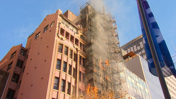 Lockhard Chambers on Macquarie Street erupted in flames only days after its cladding was removed. 