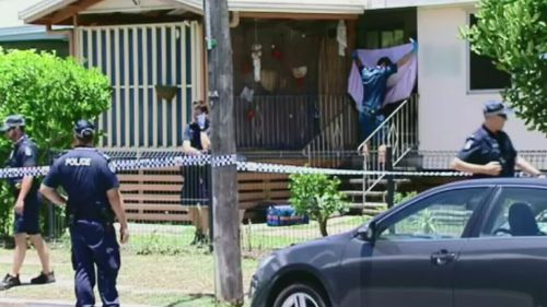 Police officers at the Manoora home last year. (9NEWS) 