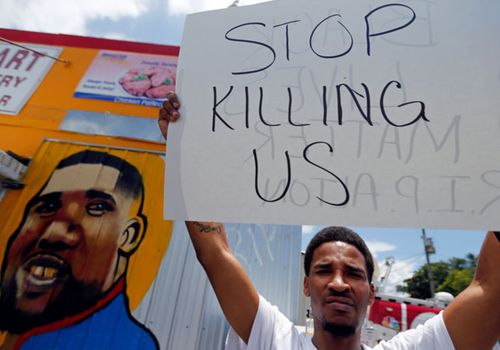 Protesters demand action over a spate of police shootings. (AP).