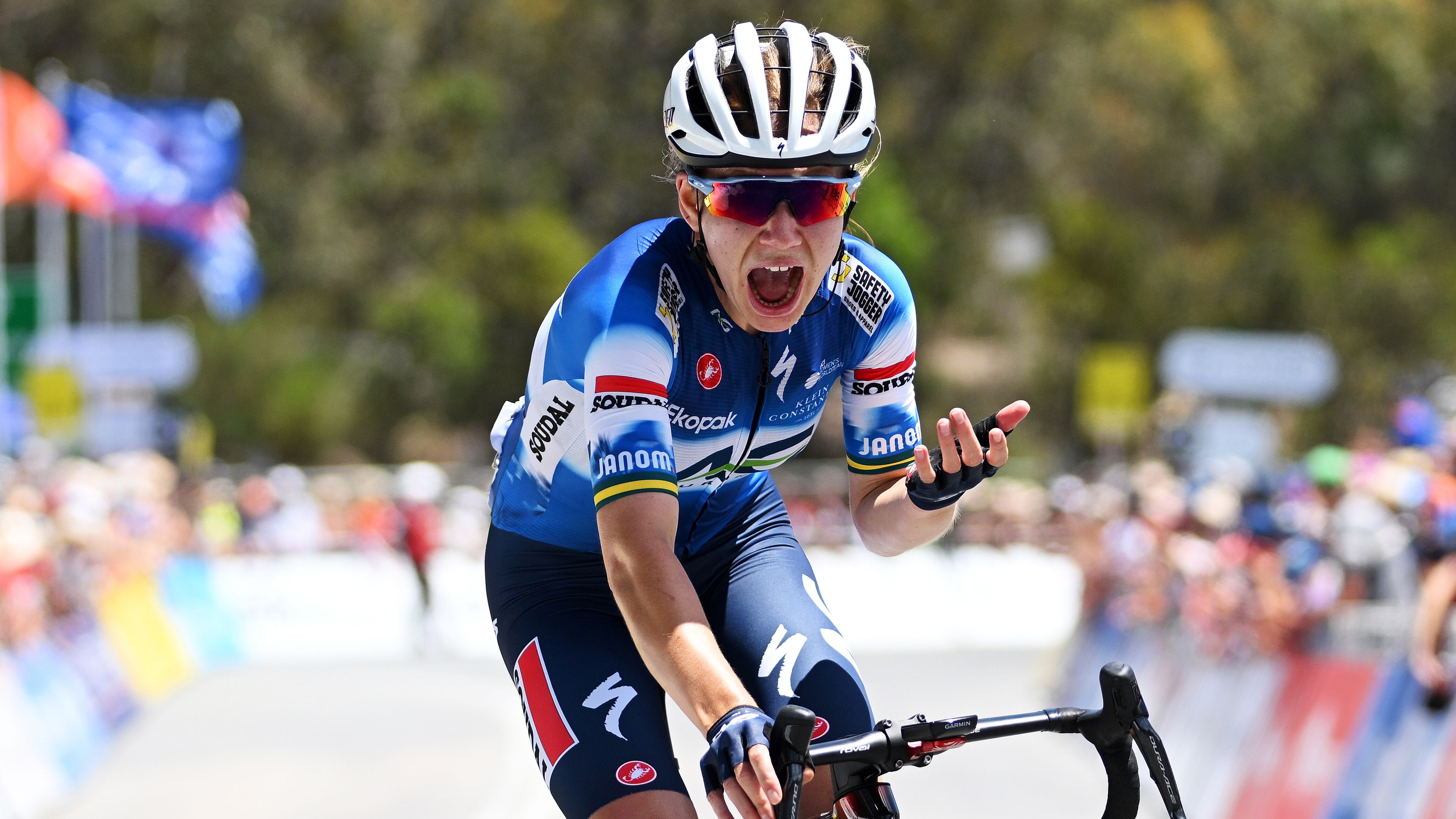 Sarah Gigante of Australia and AG Insurance - Soudal Team celebrates at finish line.