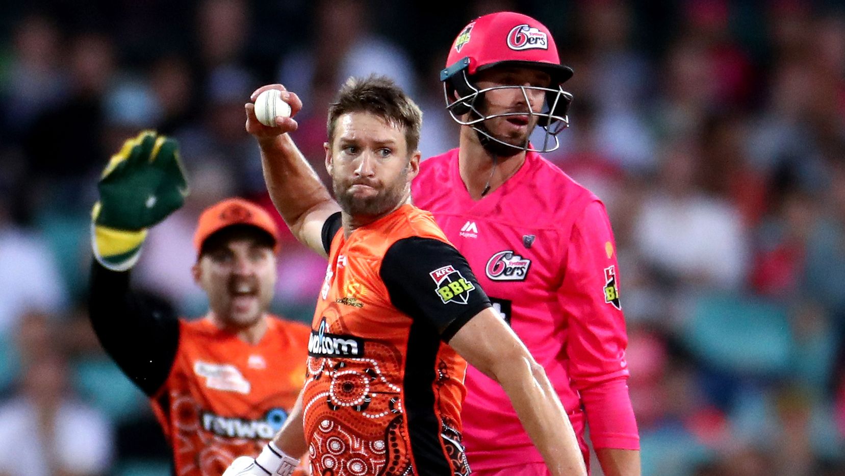 Andrew Tye of the Scorchers runs out Josh Philippe of the Sixers.