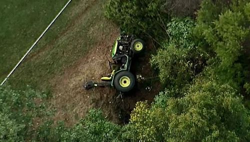 Man becomes trapped under tractor at Brisbane golf course