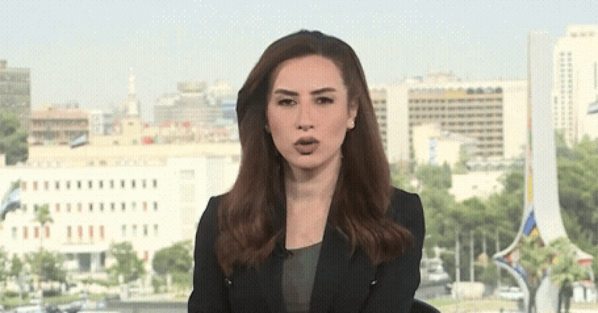 TV anchor forced to take cover after building hit live on air