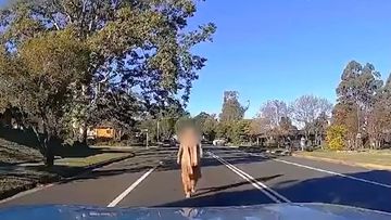 A woman has been seen laying down in front of a car on a Sydney street. Dashcam footage posted to Reddit has captured the interaction at Quakers Hill in the city&#x27;s north-west last week.