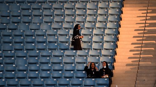 Women were allowed to enter the stadium, a previously male-only venue used mostly for football matches, with their families and seated separately from single men. (AFP)