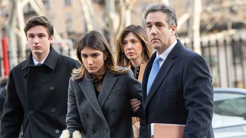 Michael Cohen outside court with his family.