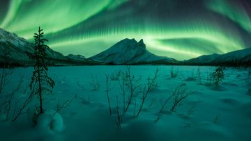 &quot;STORM OVER SUKAKPAK&quot; – NICKOLAS WARNER. Northern Lights Photographer of the Year.