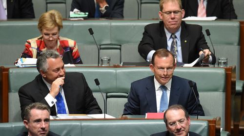 PM heaps praise on Abbott as former leader takes place on backbench