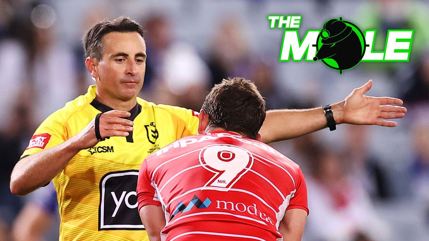 Referee Gerard Sutton speaks to Andrew McCullough of the Dragons.